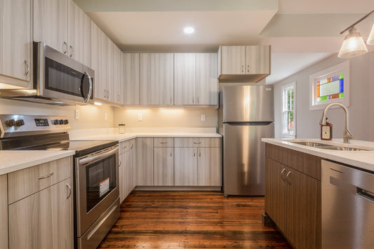 Two Kitchens, One Duplex: Light & Bright Meets Two-Tone